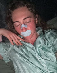 Woman Sleeping Calmly Using Breathe Bundle